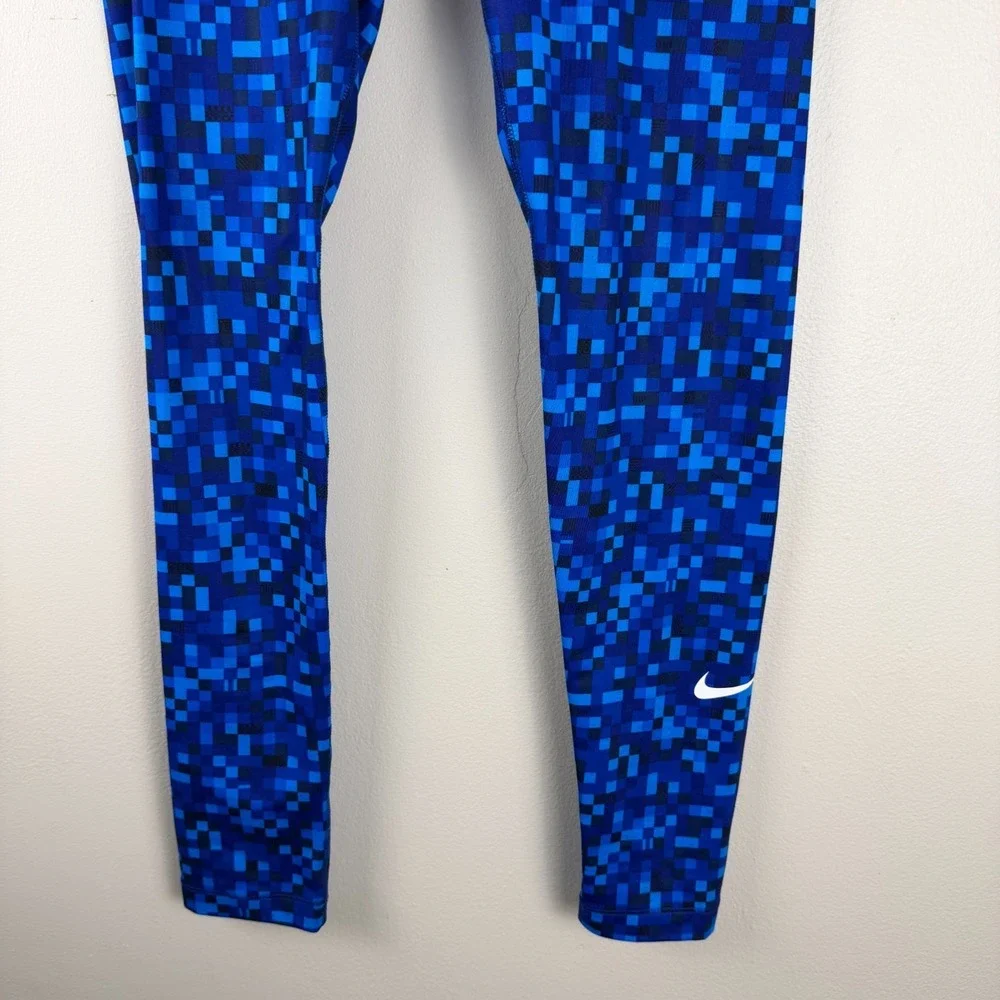 Nike shows slight